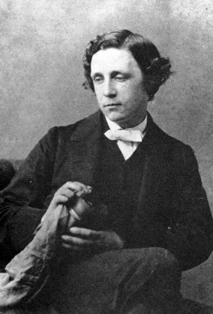 Lewis Carroll - polishing a camera lens? Photograph by Oskar Gustav Rejlander