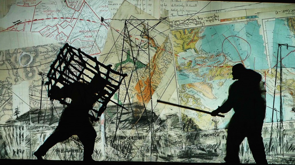 Kentridge - Notes Towards A Model Opera - cage and stick on map